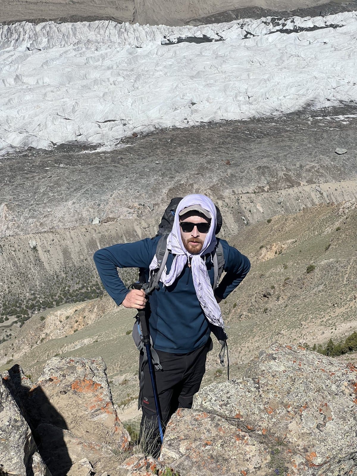 The founder climbing a snow ridge high in the mountains
