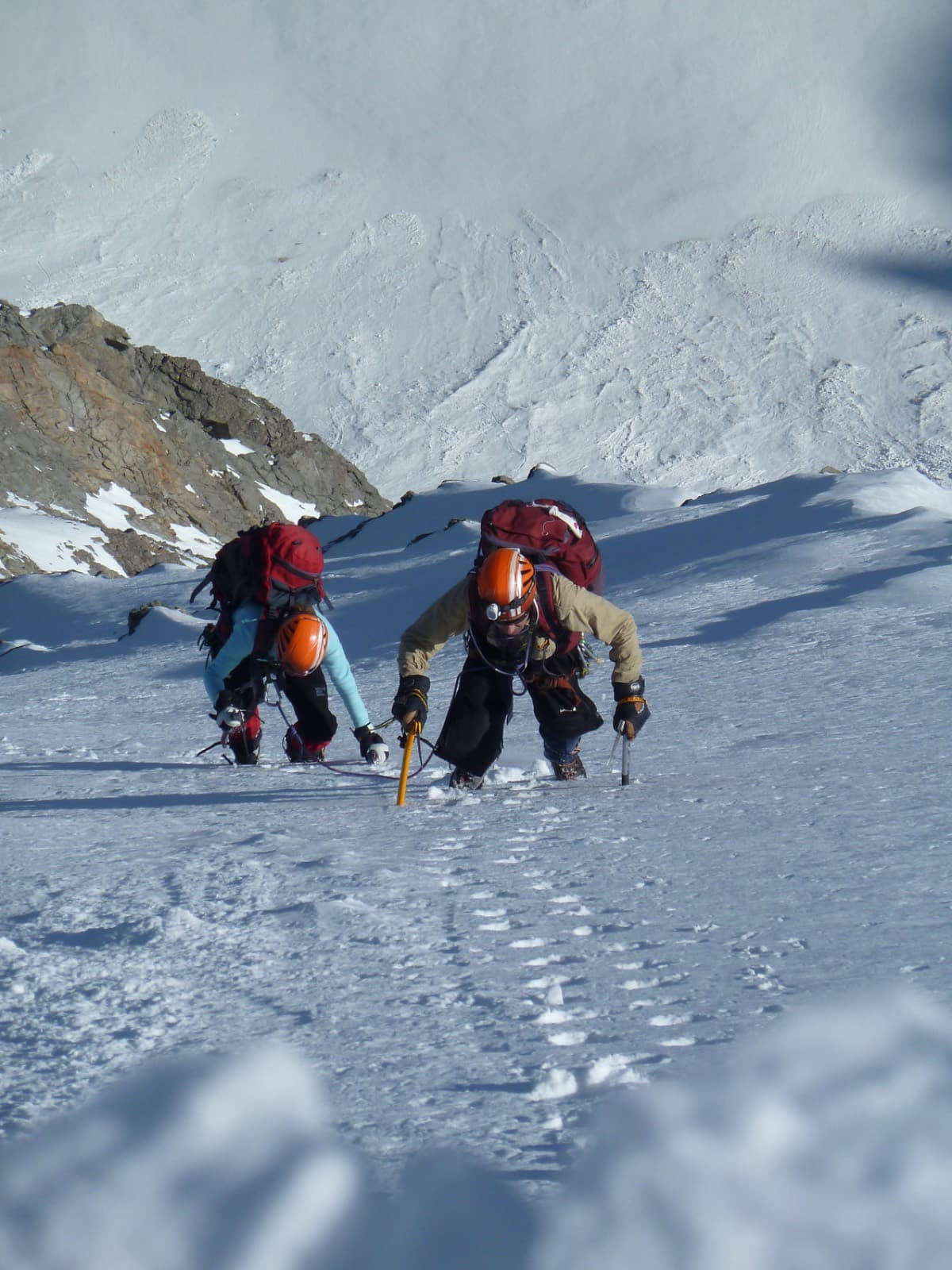 The managing director leading a roped snow climb